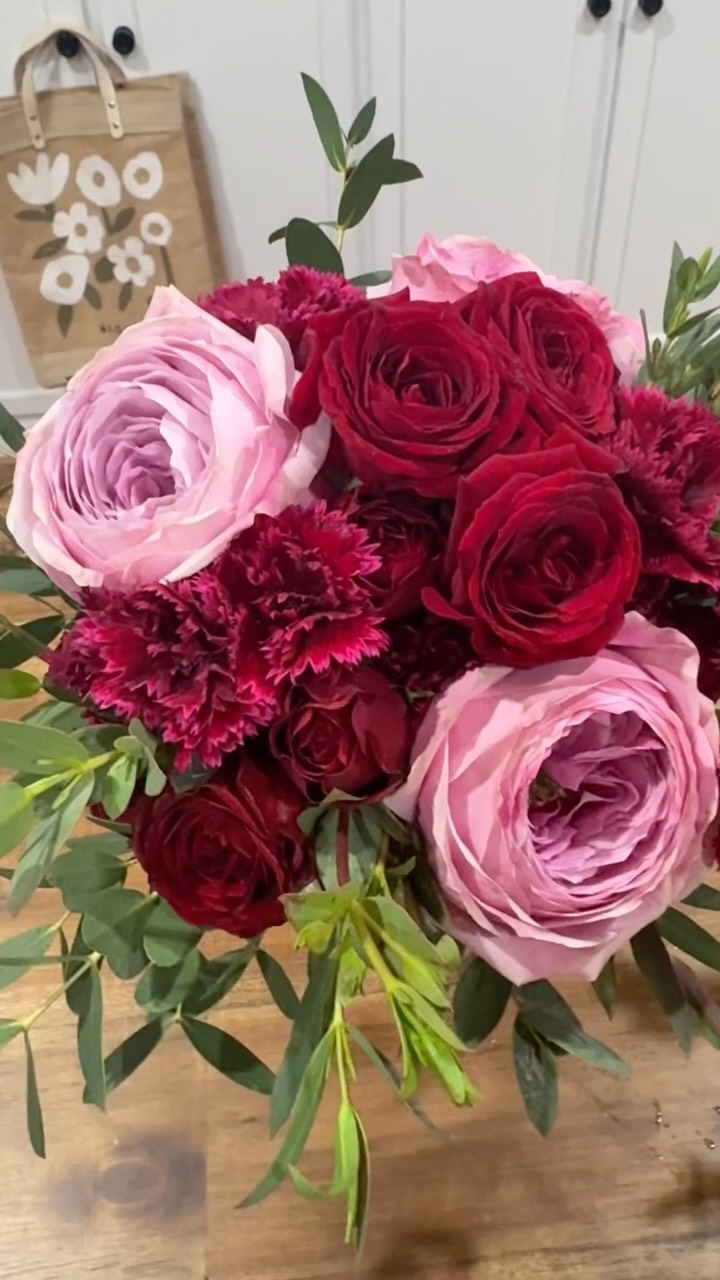 I had the pleasure of creating two Homecoming bouquets this weekend. Here’s the first, with matching boutonnière. 

She sent a picture of a dark burgundy dress and said I could do anything I wanted. I thought all red flowers might read as too red, so I added a light purplish-pink garden rose. I really loved this combination, it felt sophisticated but also super fun. All I kept thinking was, I hope she likes it. And luckily she loved it! And the gold bow even matched her shoes 😉

Flowers were from @traderjoes #traderjoesflowers 

#hocoflowers #homecomingflowers #weddingflorals